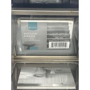 Wheel Motion Frames Pewter Holds 10 2x3 Photos Rotating Display